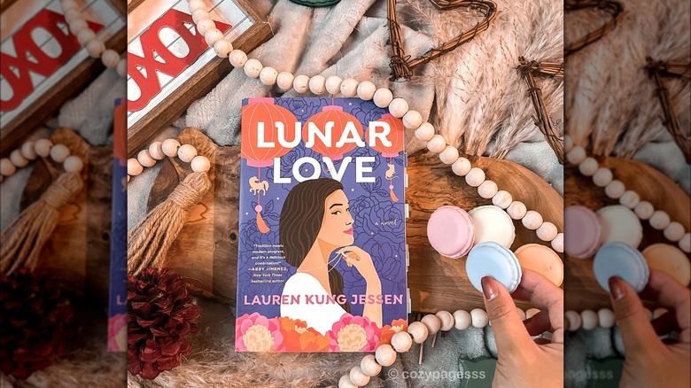 Lunar Love surrounded by aesthetic trinkets