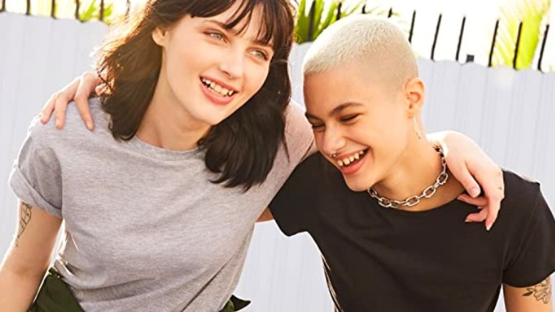 Smiling models wearing t-shirts