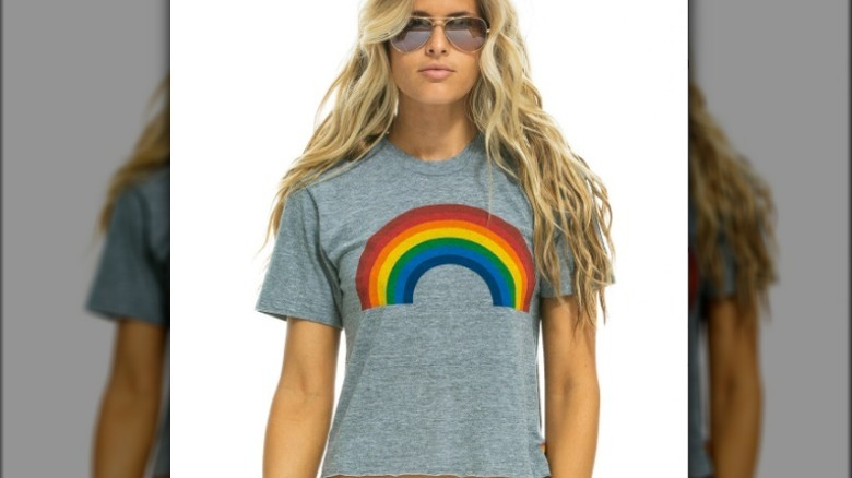 Model wearing gray cropped rainbow t-shirt