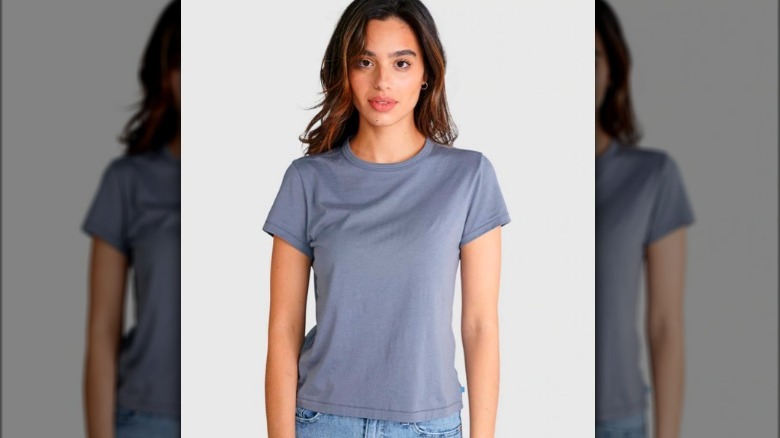 Model wearing a light blue t-shirt