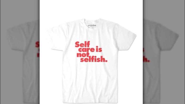 White t-shirt with red self care message