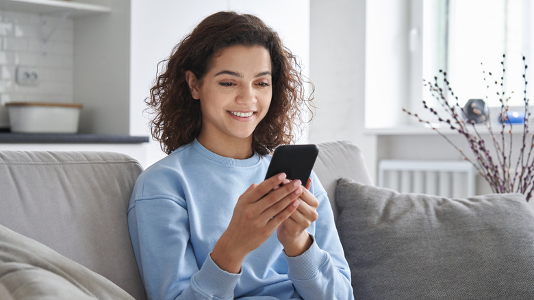 Woman reading on phone