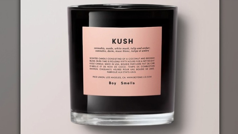 Boy smells kush candle