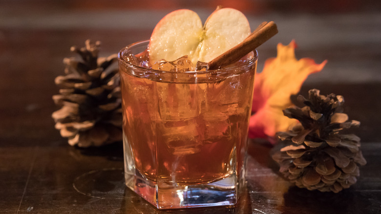 Old fashioned cocktail with pinecones