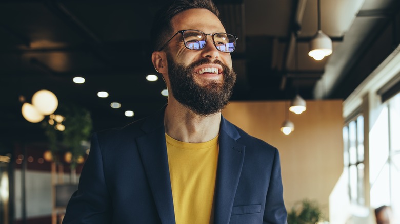 Man with beard smiling