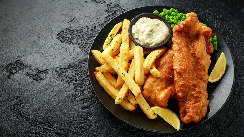 Fish and chips with peas and tartar sauce