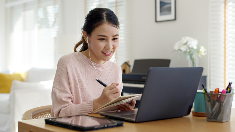 Woman on computer at home