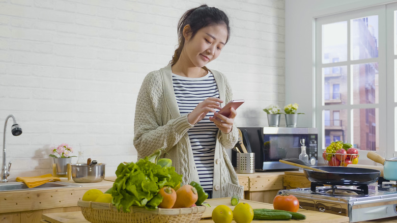 Woman looking up recipe