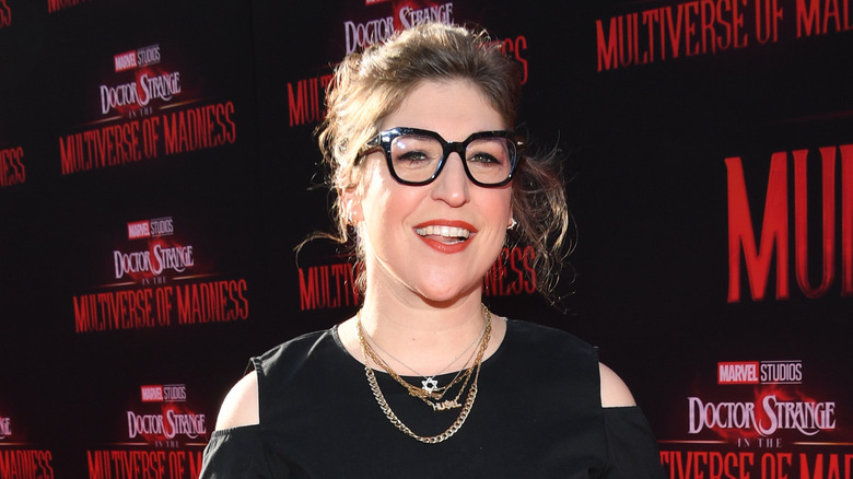 Mayim Bialik smiling in glasses