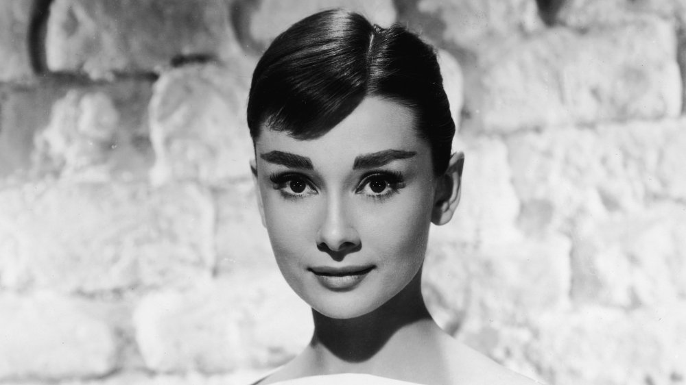 Audrey Hepburn, showing off one of the best eyebrow trends in history