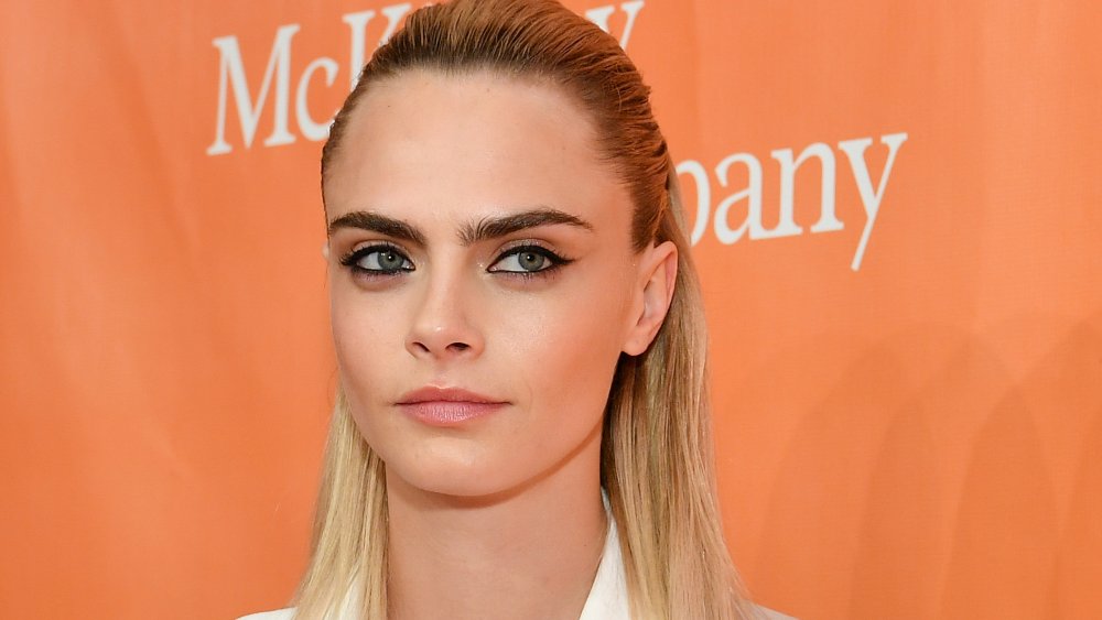 Cara Delevingne, showing off one of the best eyebrow trends in history