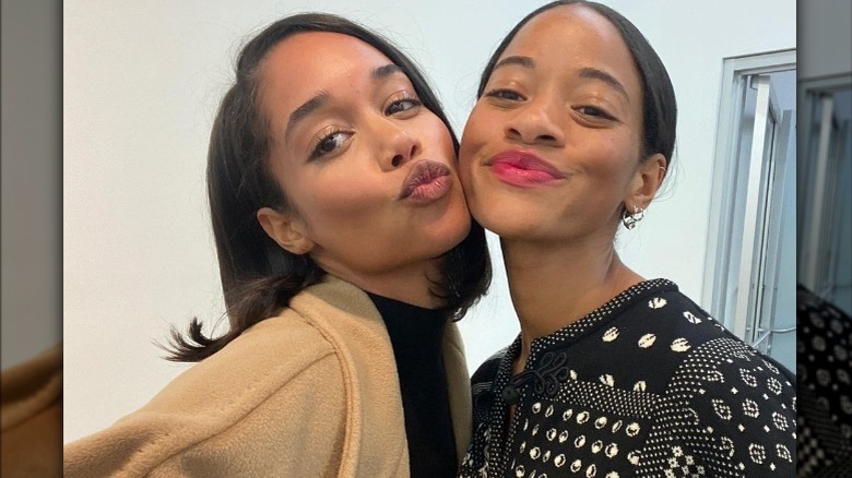 Laura Harrier and friend smiling