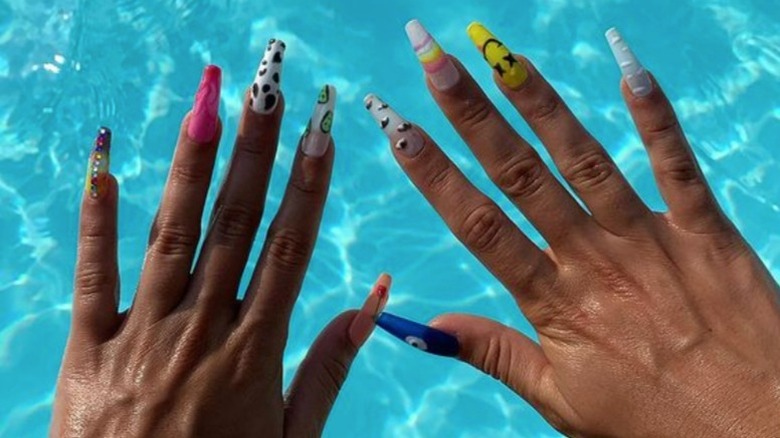 colorful nails over water