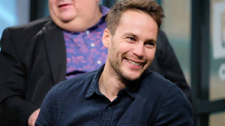 Taylor Kitsch smiling in interview