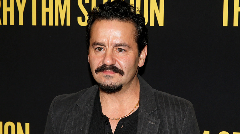 Max Casella posing at a premiere