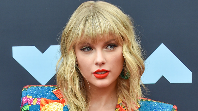 Taylor Swift at the VMAs with a red lip