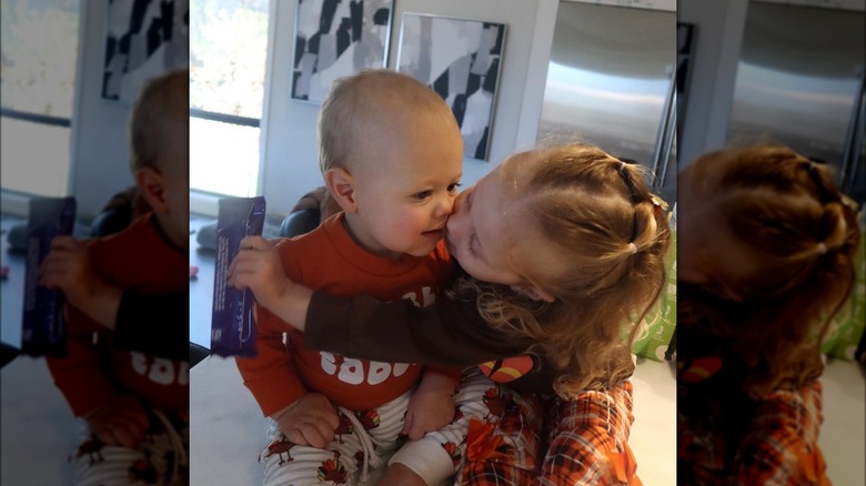 Sterling kissing her brother Bronze