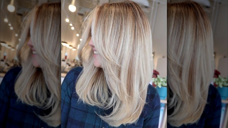 Blonde woman with an air cut