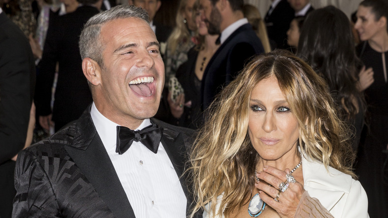 Andy Cohen laughing with Sarah Jessica Parker