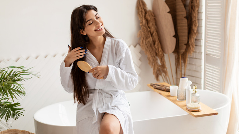 Woman brushing her hair