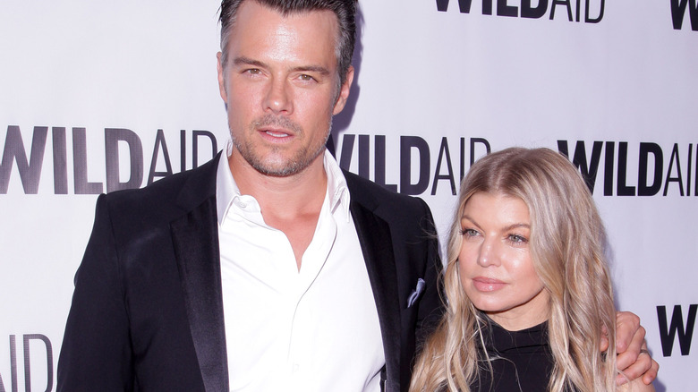 Josh Duhamel hugging Fergie 