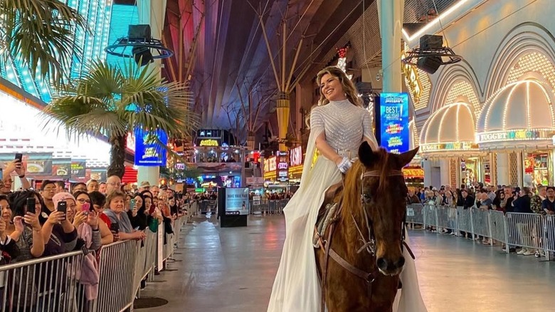 Shania Twain riding a horse in vegas