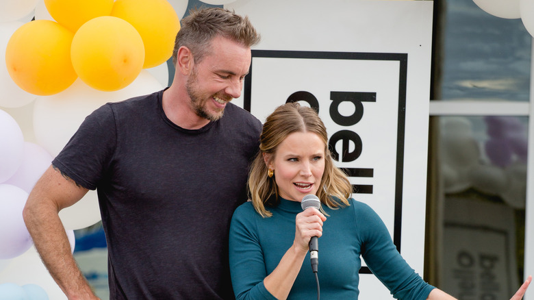 Kristen Bell and Dax Shepard speak at an event