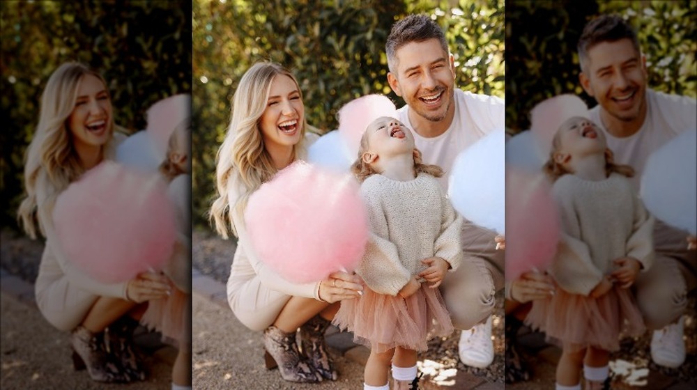 Arie Luyendyk and Lauren Burnham pose with Alessi and cotton candy