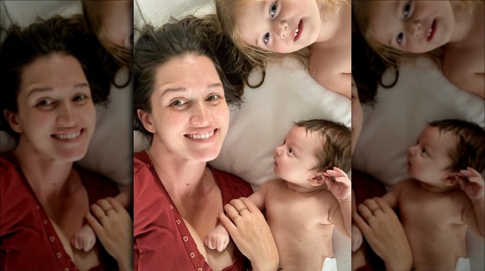 Jade Roper smiles with her kids