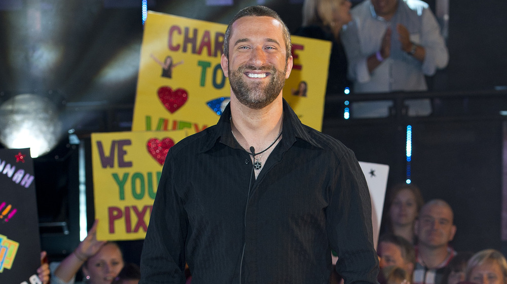 Dustin Diamond smiling on red carpet