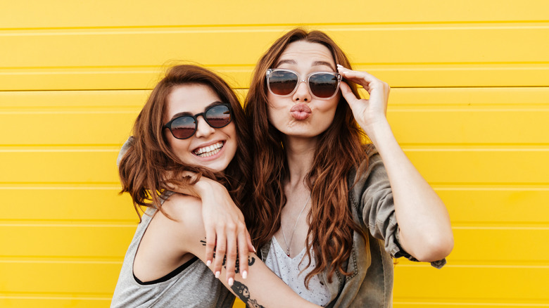 Two women smiling