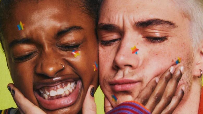 Two models wear starface's rainbow patches