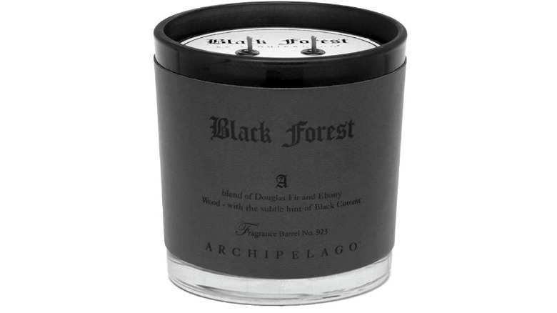 Black candle with black label that says "Black Forest"