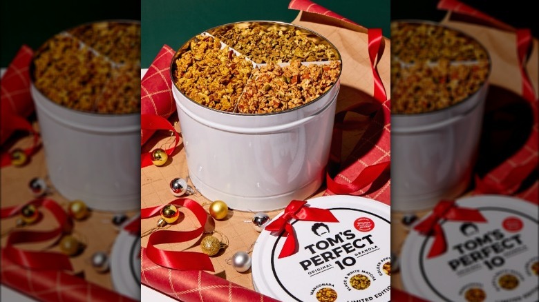 Large white tin with three types of granola