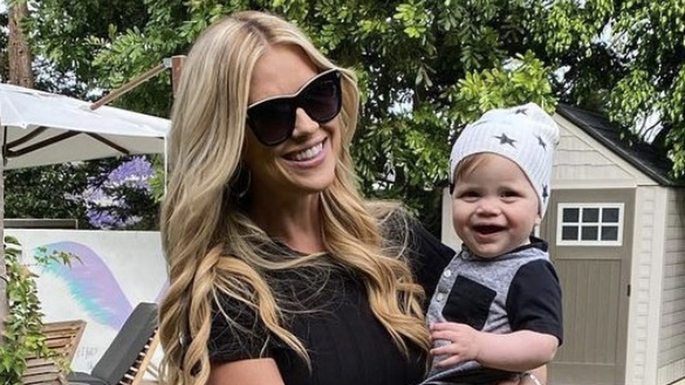 Christina Anstead holding Hudson Anstead