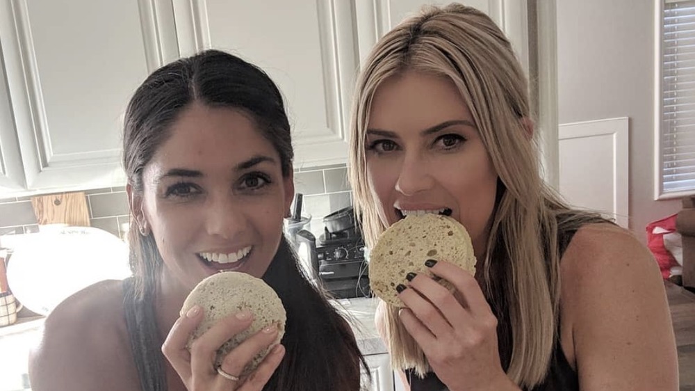 Christina Anstead and Cara Clark eating