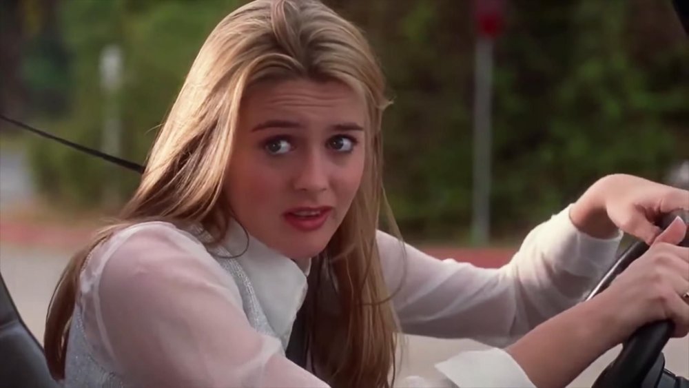 Cher driving during her road test in Clueless