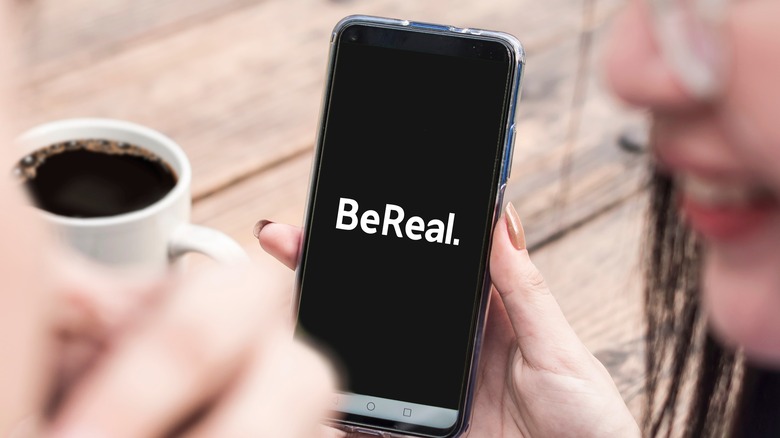 Phone shows BeReal app logo