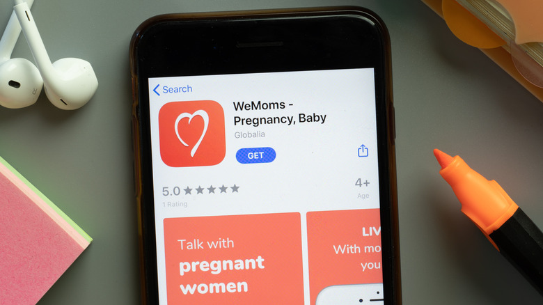 WeMoms app open on phone