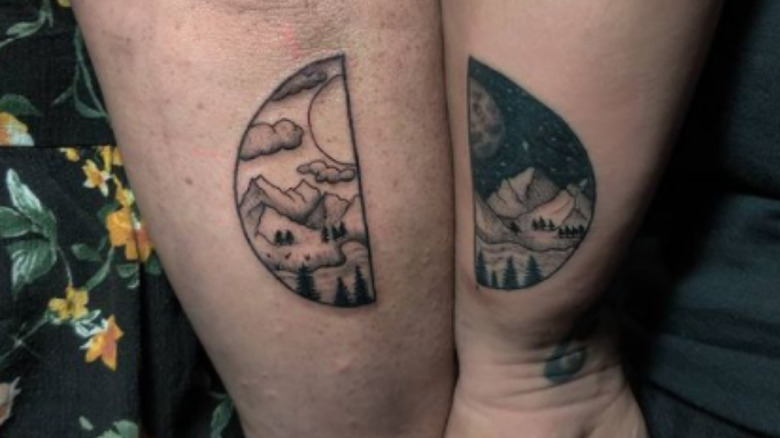 matching halves tattoos of vacation scene