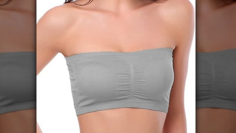 Model wears gray bandeau bra