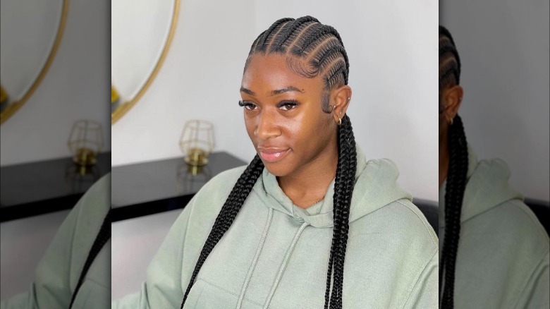 woman with stitch cornrows 