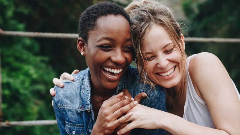 Two women on a date laughing