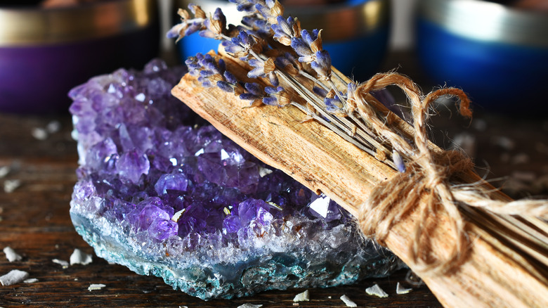 amethyst crystal with smudge stick