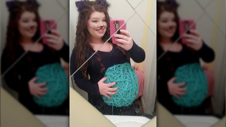 Pregnant woman cat costume