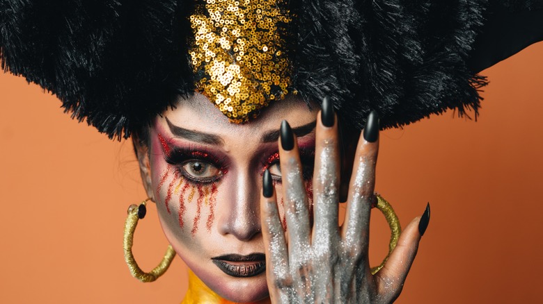 A woman in spooky makeup