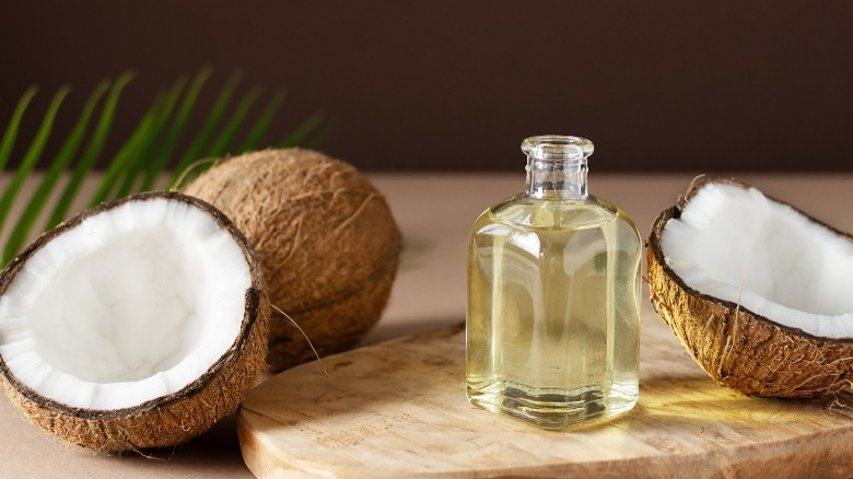 coconut oil in glass bottle