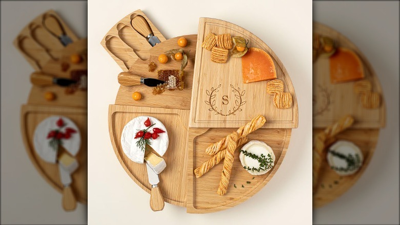 Personalized Compact Swivel Cheese Board hostess gift from Uncommon Goods