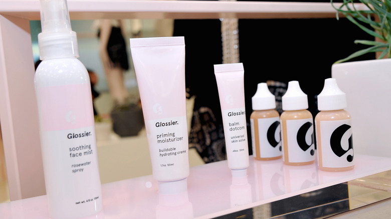 Display of Glossier skincare and makeup products