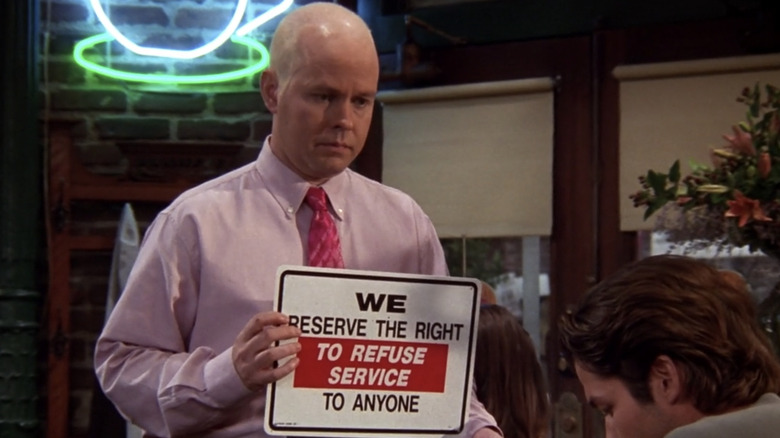 Gunther holding sign on Friends 